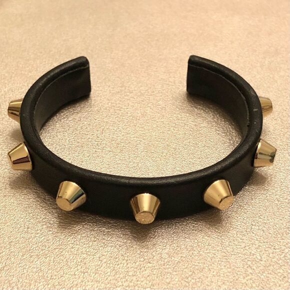 Faux Leather Stud Cuff Bracelet | Black and Gold | 2.5” Diameter - Picture 1 of 3